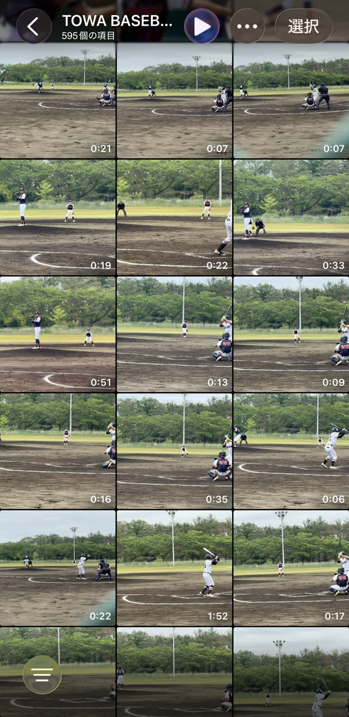 写真アプリ。野球の動画が595本並んでいる