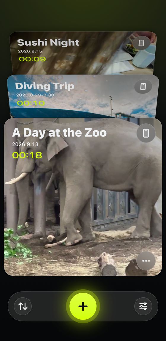 Home screen. Reel cards are stacked, with a + button below